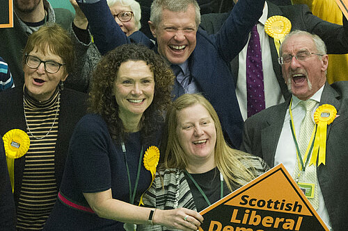 Wendy Chamberlain MP celebrates winning the 2019 General Election with a crowd of supporters